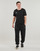 Textil Homem Calças de treino Puma ESS WOVEN PANTS Preto